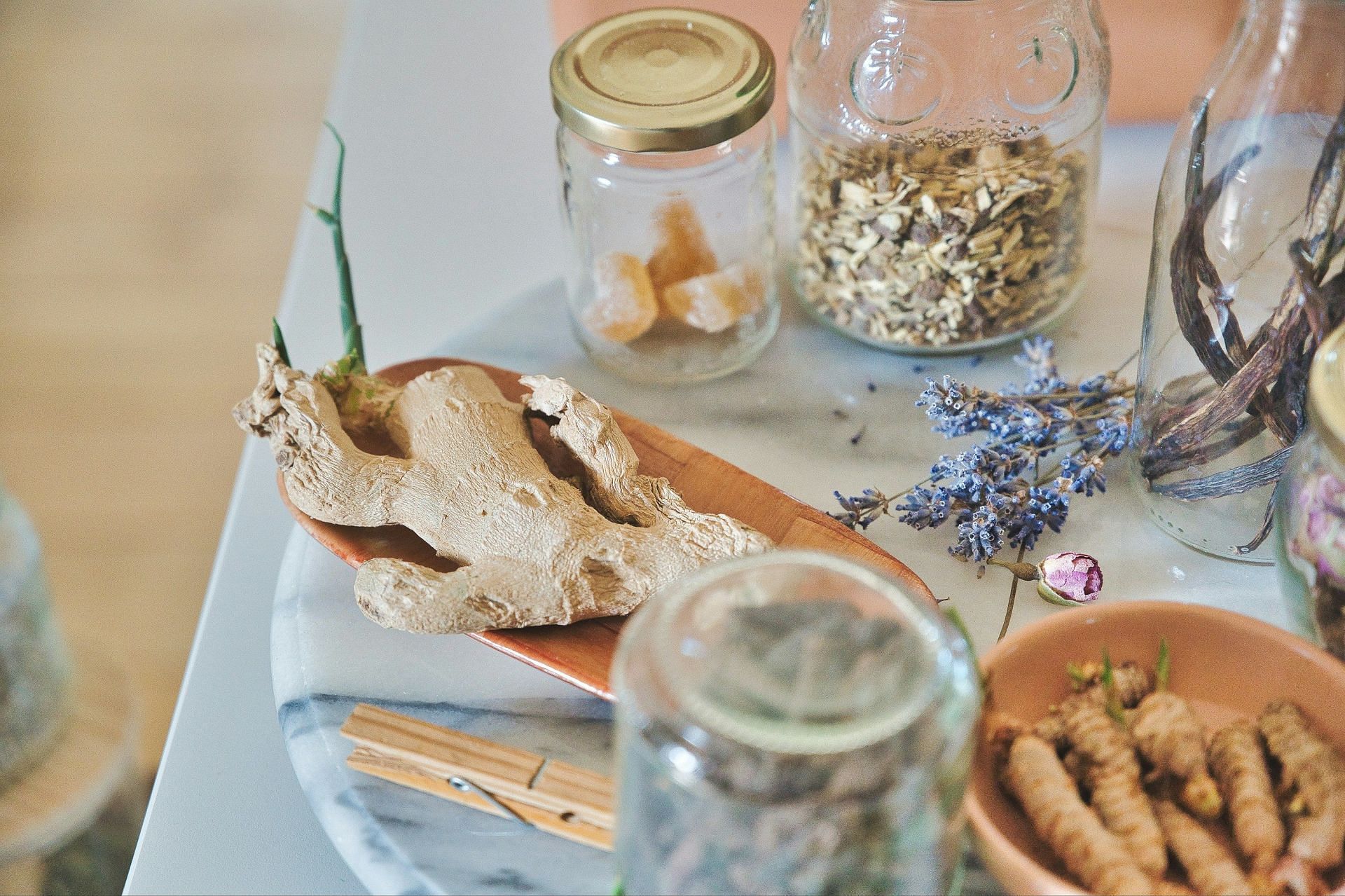 Drinking ginger juice or shots can also help. (Image via Unsplash/Conscious Design)